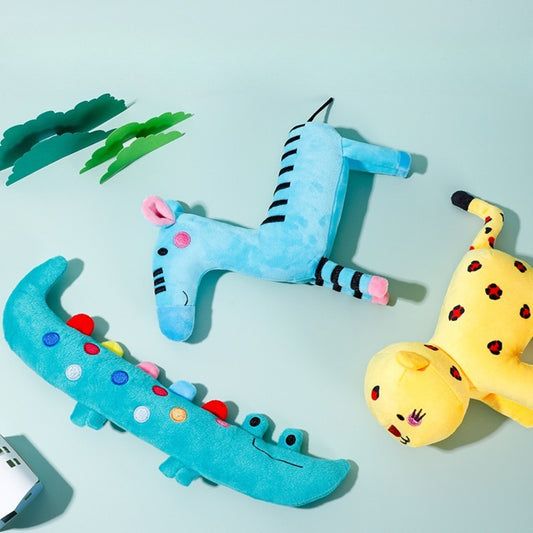 Close-up of Petkin cartoon animal plush dog toy showing soft texture and vibrant colors
