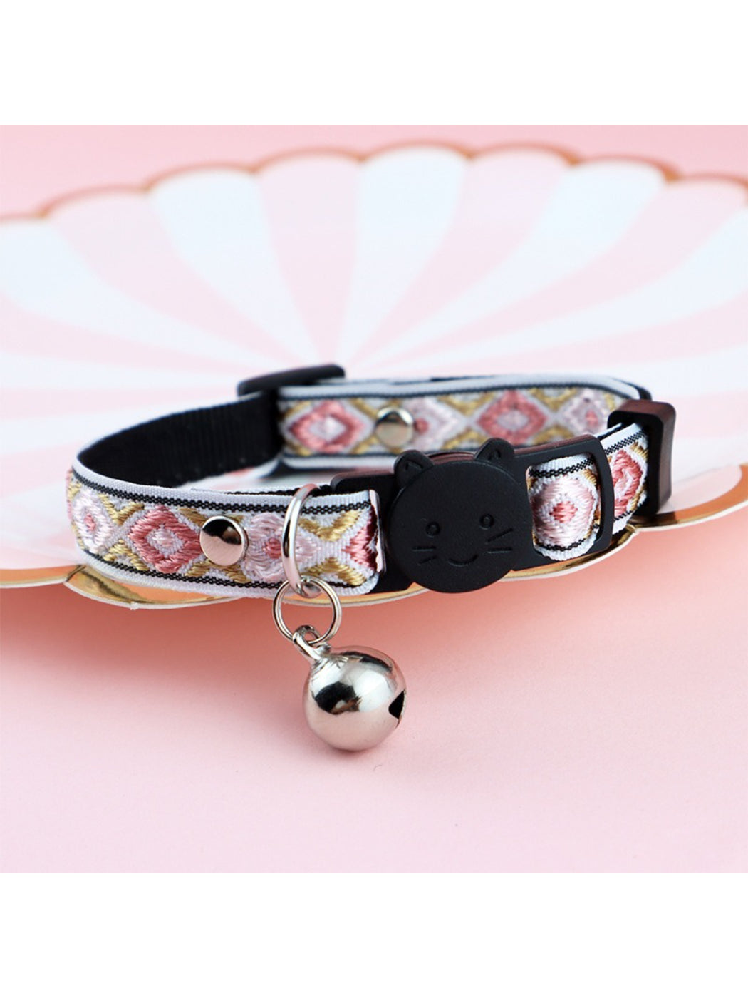 Packaging of Mokka diamond weave bell cat collar with product label and branding