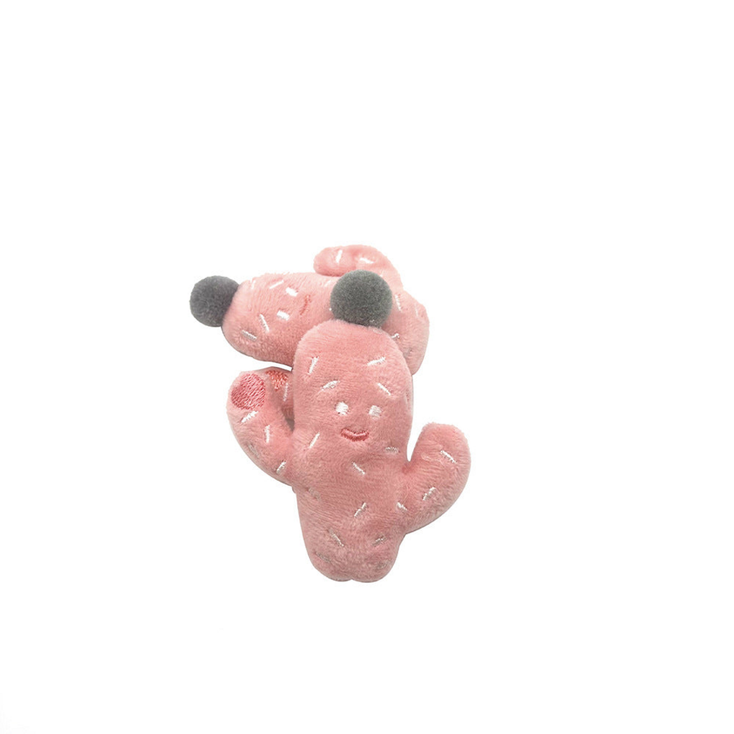 Pink cactus-shaped cat toys with gray top balls and embroidered smiling faces