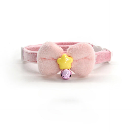 Close-up of Mokka Sweet Star Bow Breakaway Cat Collar showing pink bow and adjustable strap
