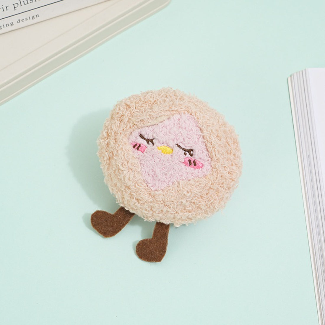Moo food plush cat toy with embroidered details and soft plush material