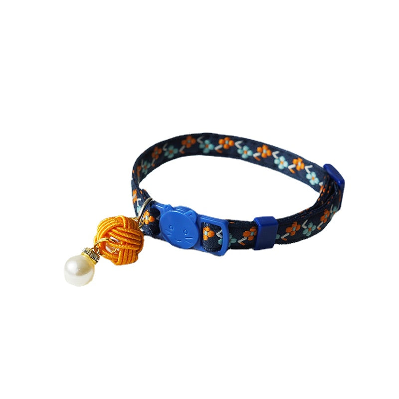 Mokka Pearl Flower Cat Collar with pearl flower detail photographed close-up