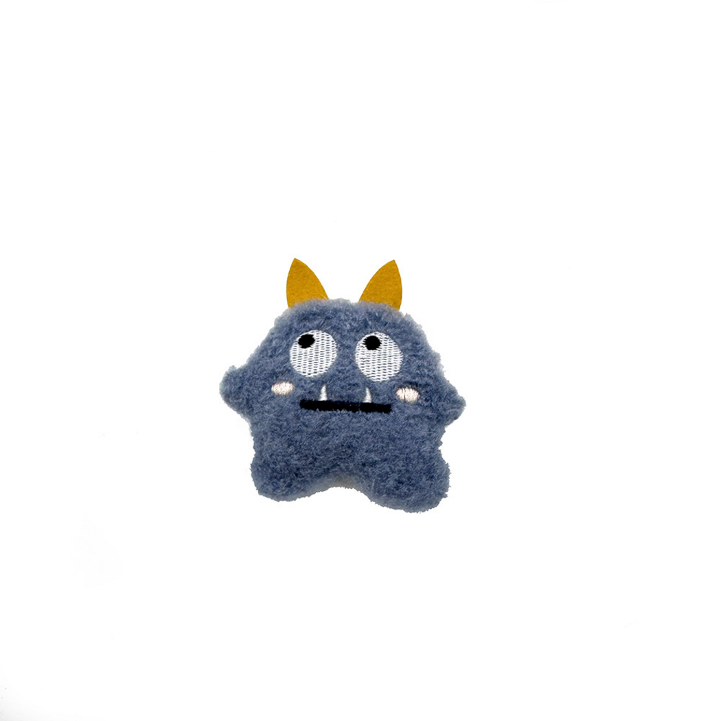 Blue Two-eyed plush cat toy with yellow pointed appendages and a stitched face, front view