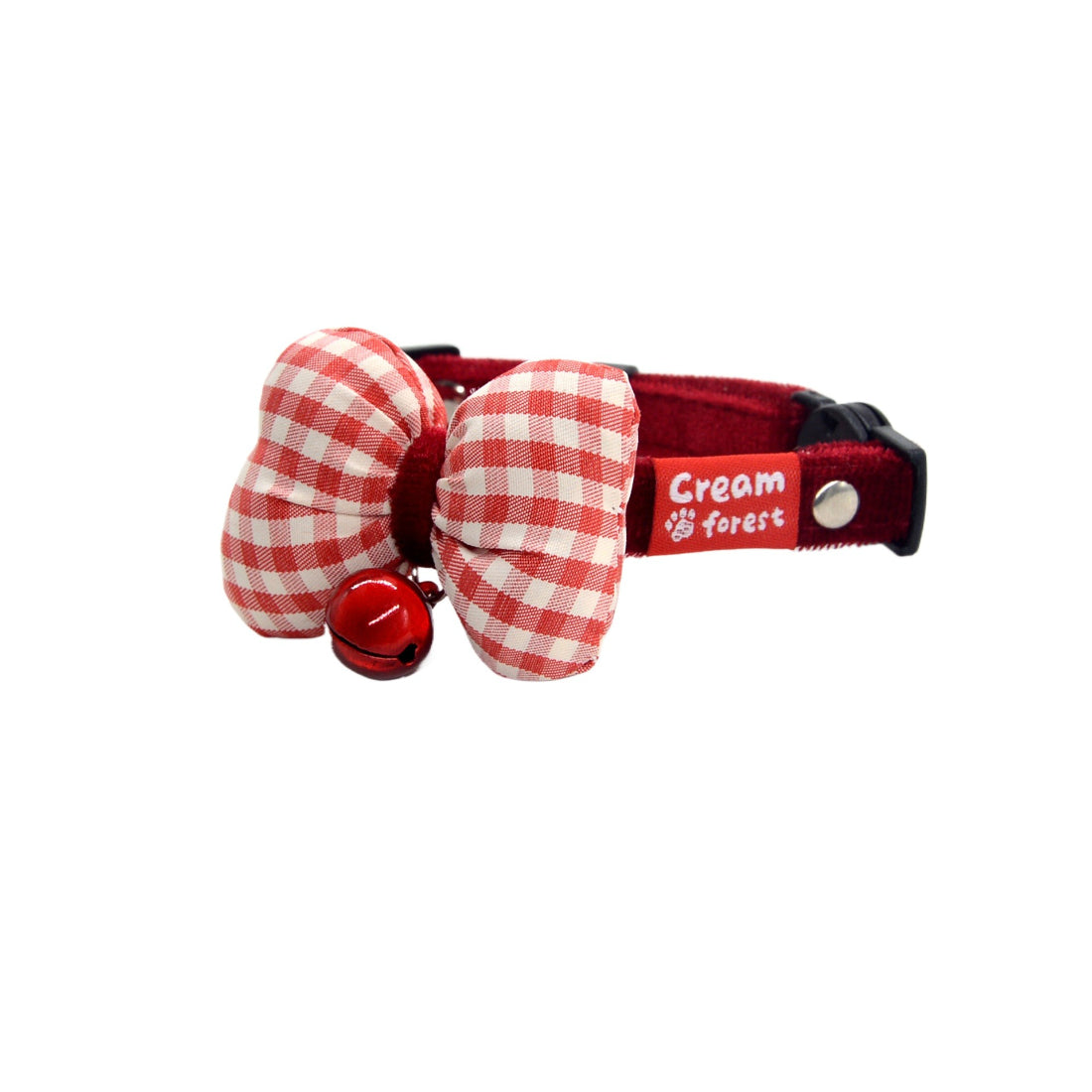 Red breakaway cat collar with bow and bell displayed flat