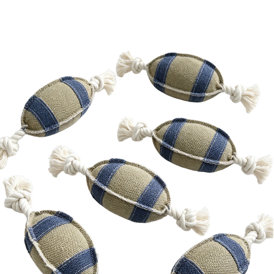 Multiple beige and blue oval rope dog toys arranged together