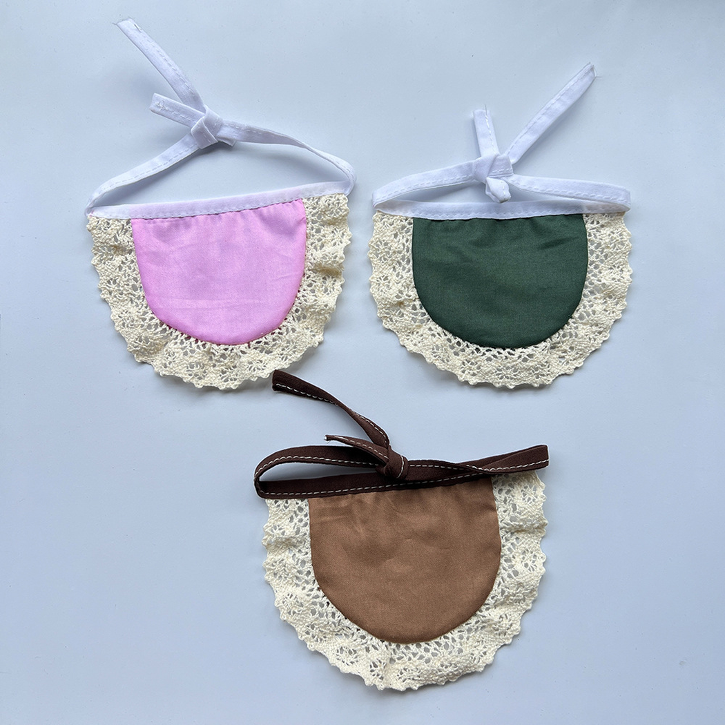 Reverse view of three Cat Neckwear styles with plain backing panels, scalloped cream trim and tied straps.
