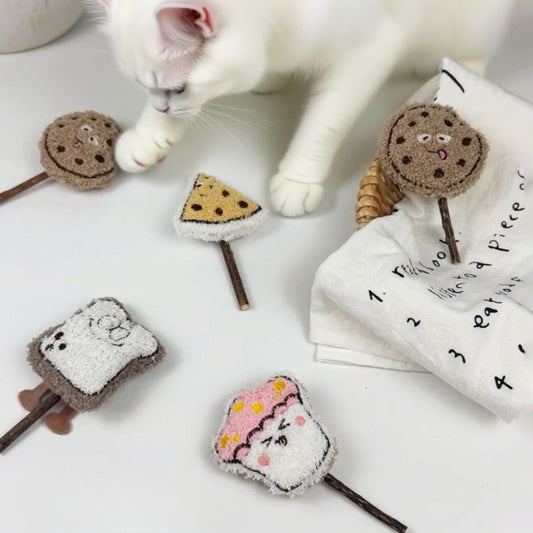 Close-up of Moo plush cat stick toy showing detailed stitching and vibrant colors