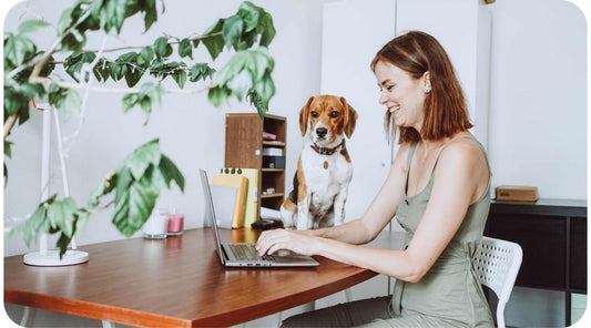 Woman taking her dog to work