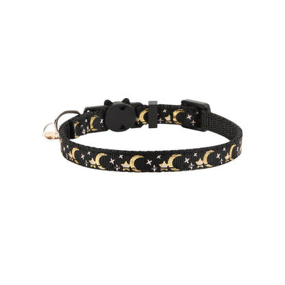 Mokka cat collar with celestial moon and star design displayed flat with bell