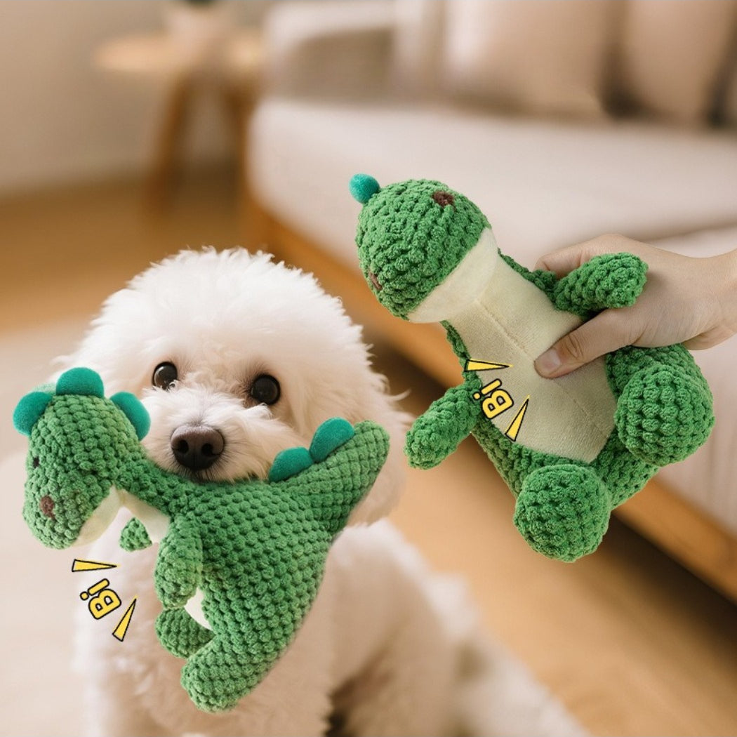 Petkin squeaky dinosaur plush toy in green, orange spikes and friendly face