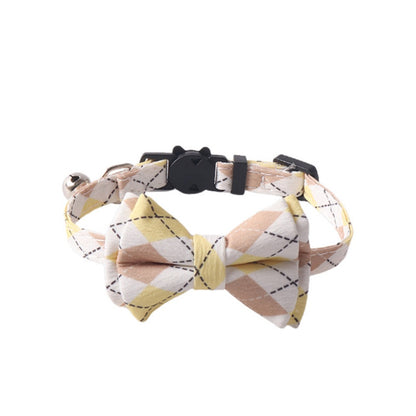 Mokka Argyle bow tie cat collar with metal buckle on a plain background