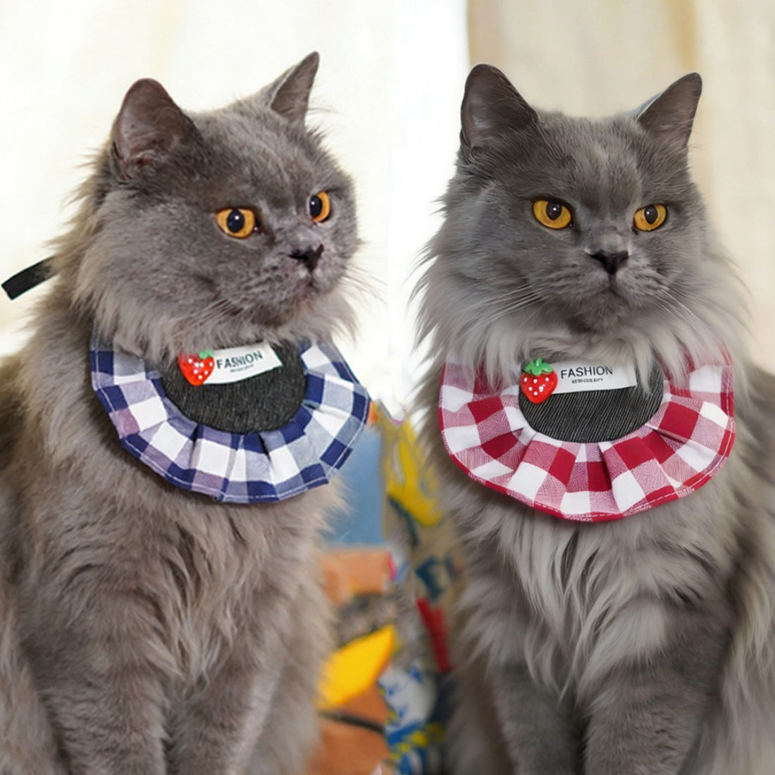 Strawberry gingham cat bib with pink and white checkered pattern on a white background