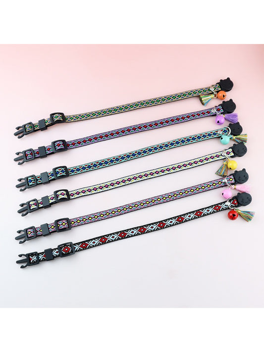 Close-up of Mokka Boho pattern fabric and metal buckle on adjustable cat collar