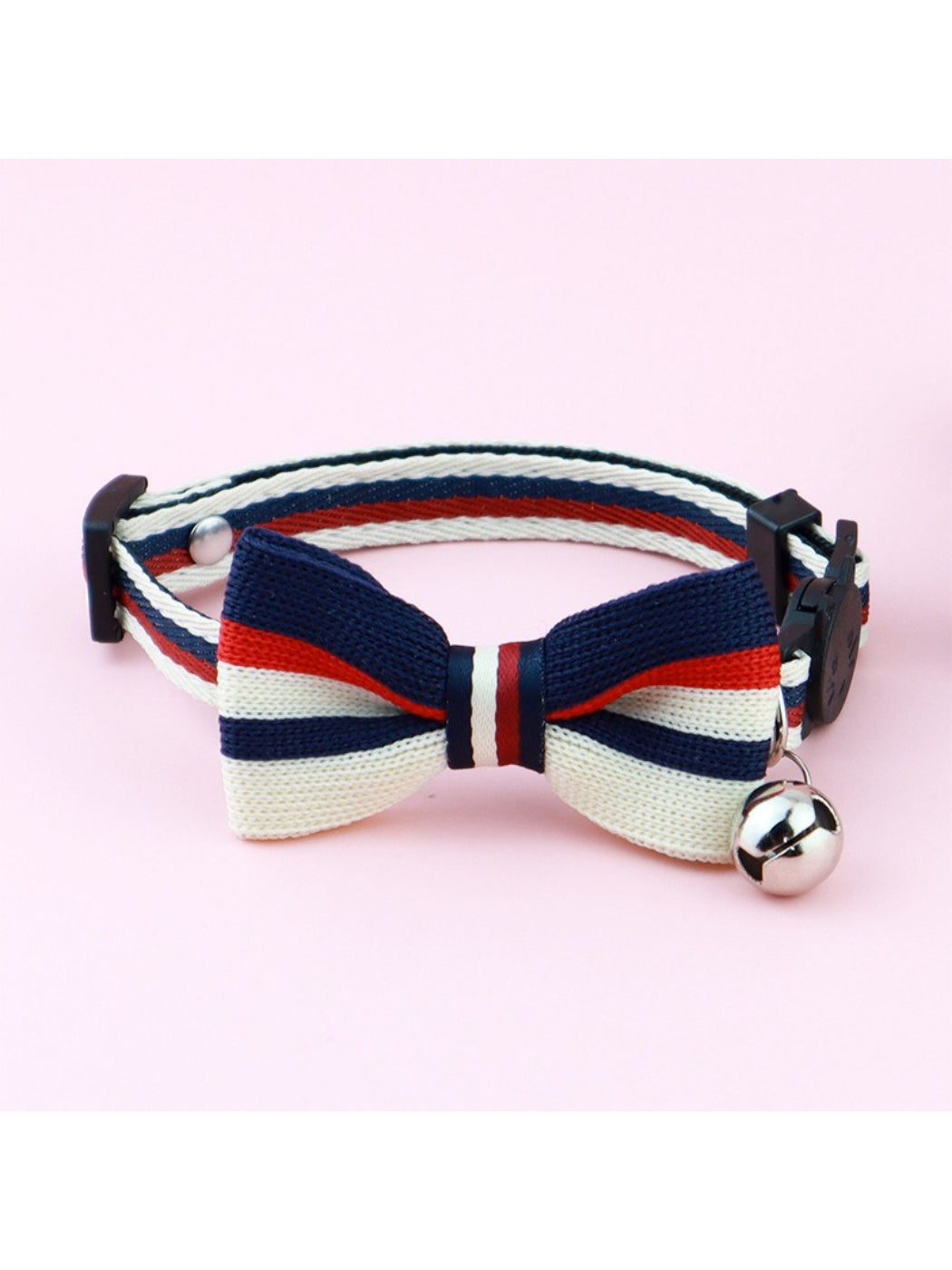 Mokka striped bow cat collar laid flat highlighting bow and striped pattern