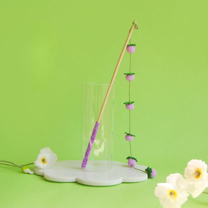 Moo Hanging Pom Wand interactive cat toy with multiple pom poms in bright colors
