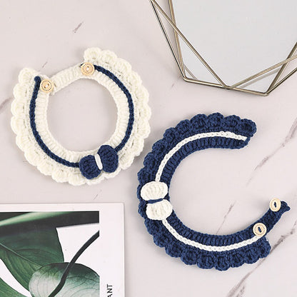 Mokka crochet cat collar displayed flat showing button and bell details