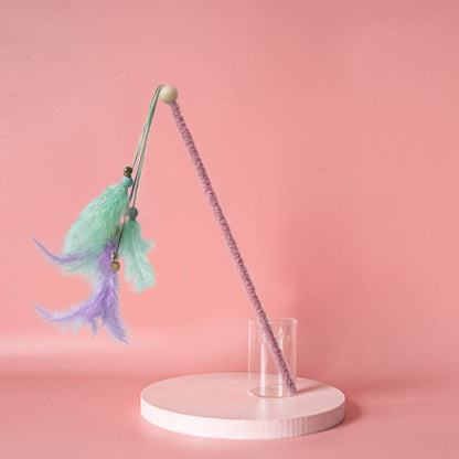 Moo Interactive Feather Wand with multicolored feathers shown from side angle