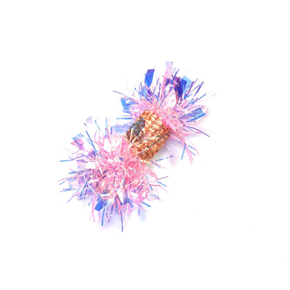 Moo Sparkle Tinsel Cat Toy held in hand with sparkling tinsel strands