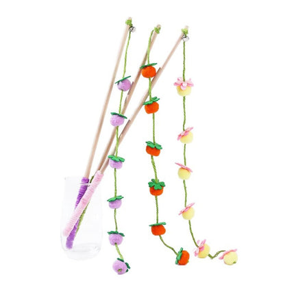 Close-up of colorful beads on the Moo Garden Beads Wand Cat Toy