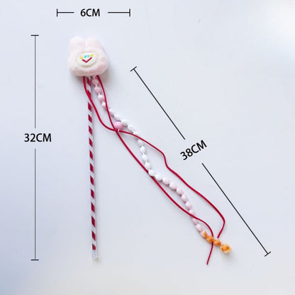 Moo plush cat teaser wand with colorful beads shown from side angle