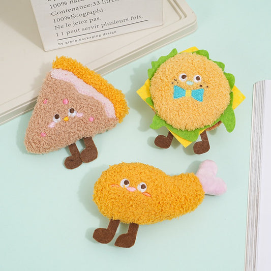 Close-up of Moo plush cat toy showing detailed stitching and soft texture