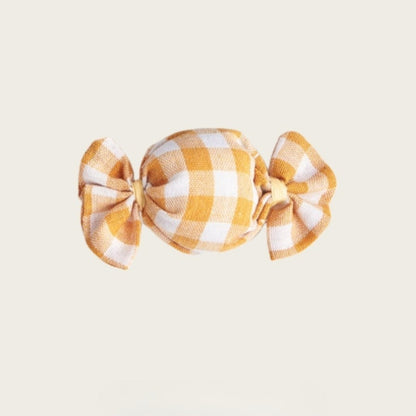 Close-up of Moo gingham candy shape cat toy showing soft fabric texture and stitching