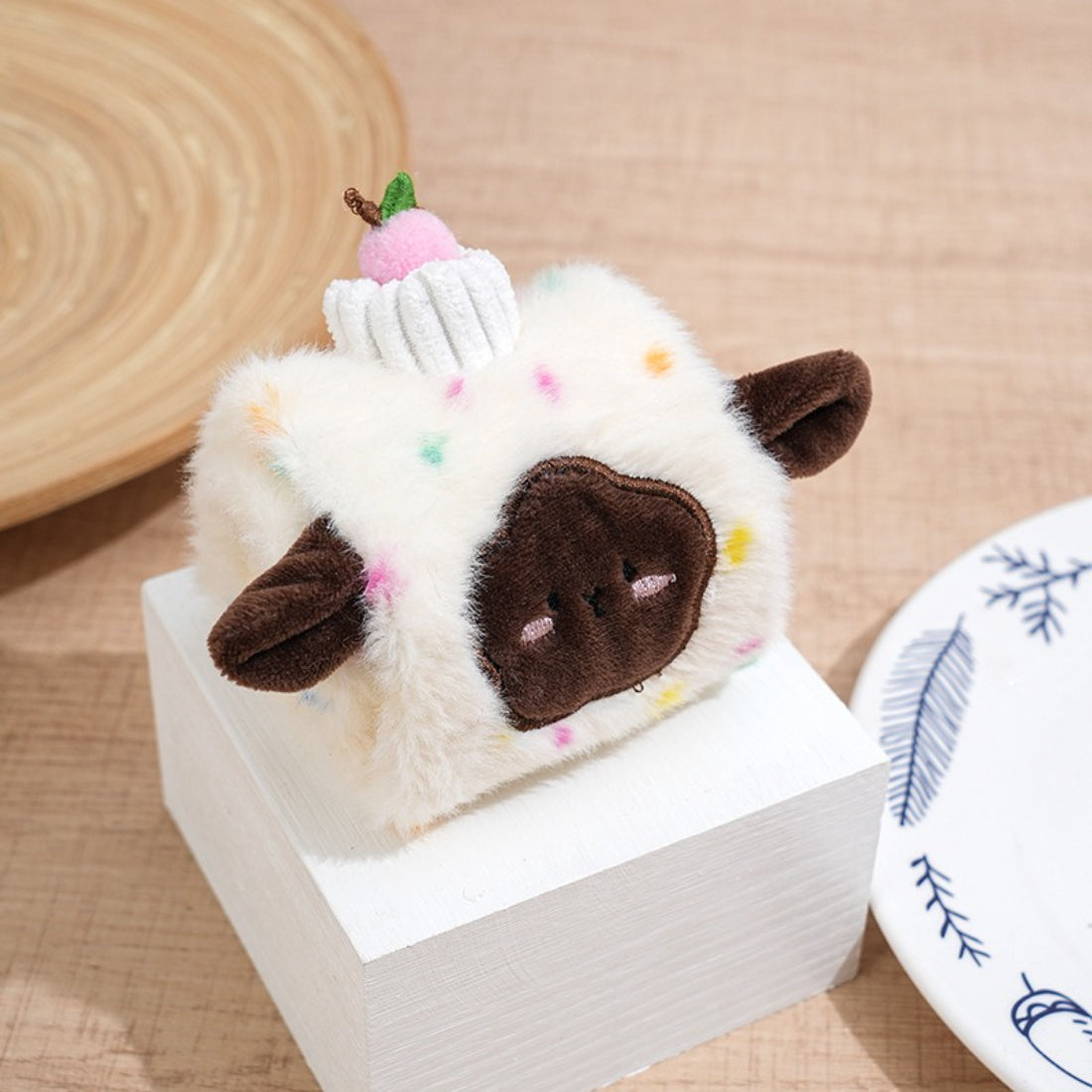 Close-up of Petkin soft cube dog toy showing stitched animal face details