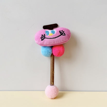 Moo plush cat toy attached to a wooden stick with a string for interactive play