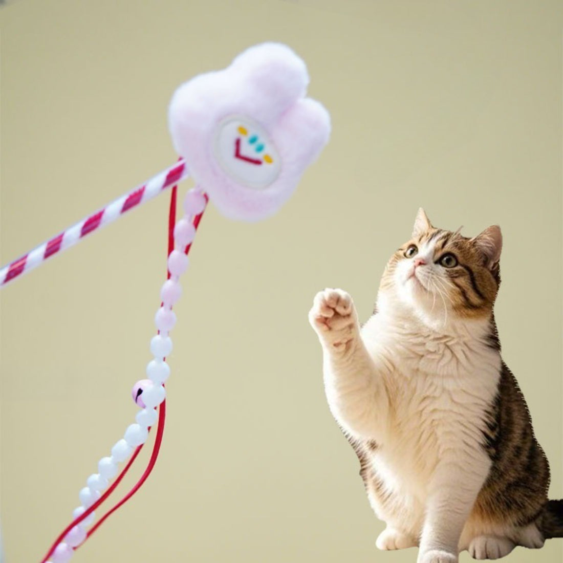 Close-up of Moo plush cat teaser wand showing soft plush and beads