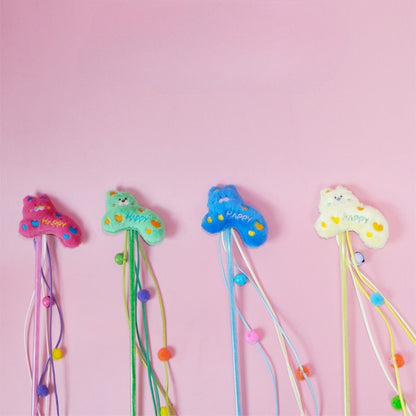 Close-up of Moo Happy Plush Ribbon Cat Teaser Wand showing vibrant ribbon details