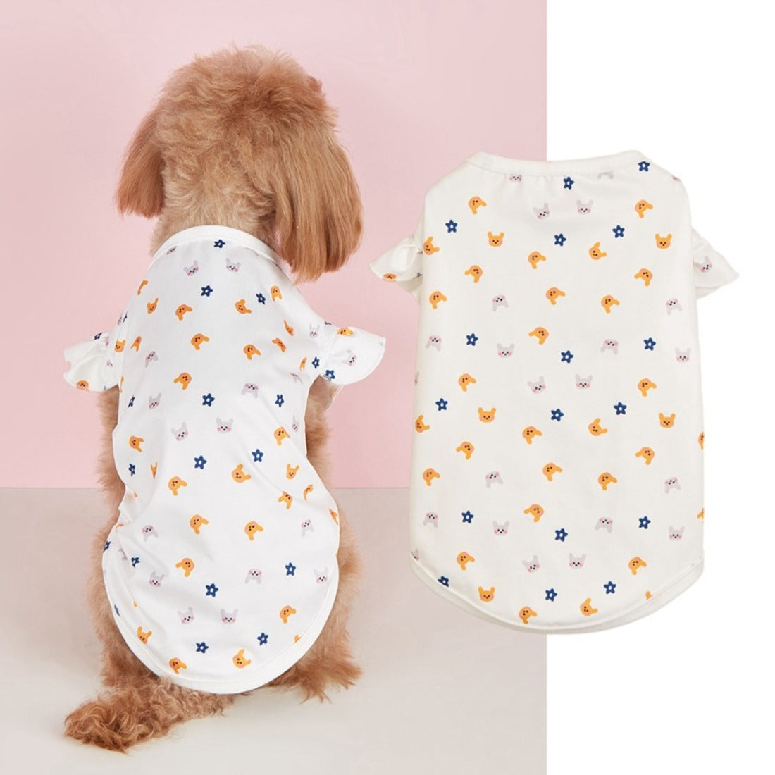 Ozzie dog wearing a cute print ruffle t-shirt sitting on a wooden floor