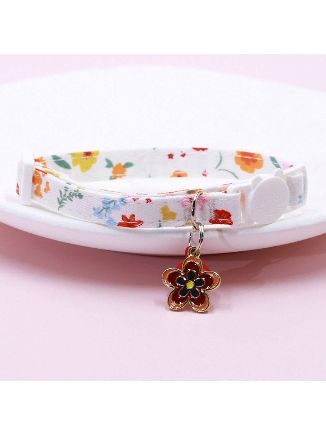 Side view of Mokka Floral Charm Bell Cat Collar highlighting floral pattern and bell