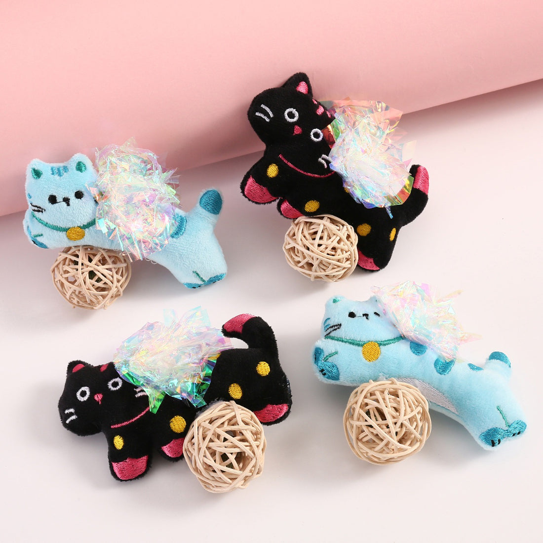 Close-up of Moo plush cat toy showing detailed stitching and crinkle material