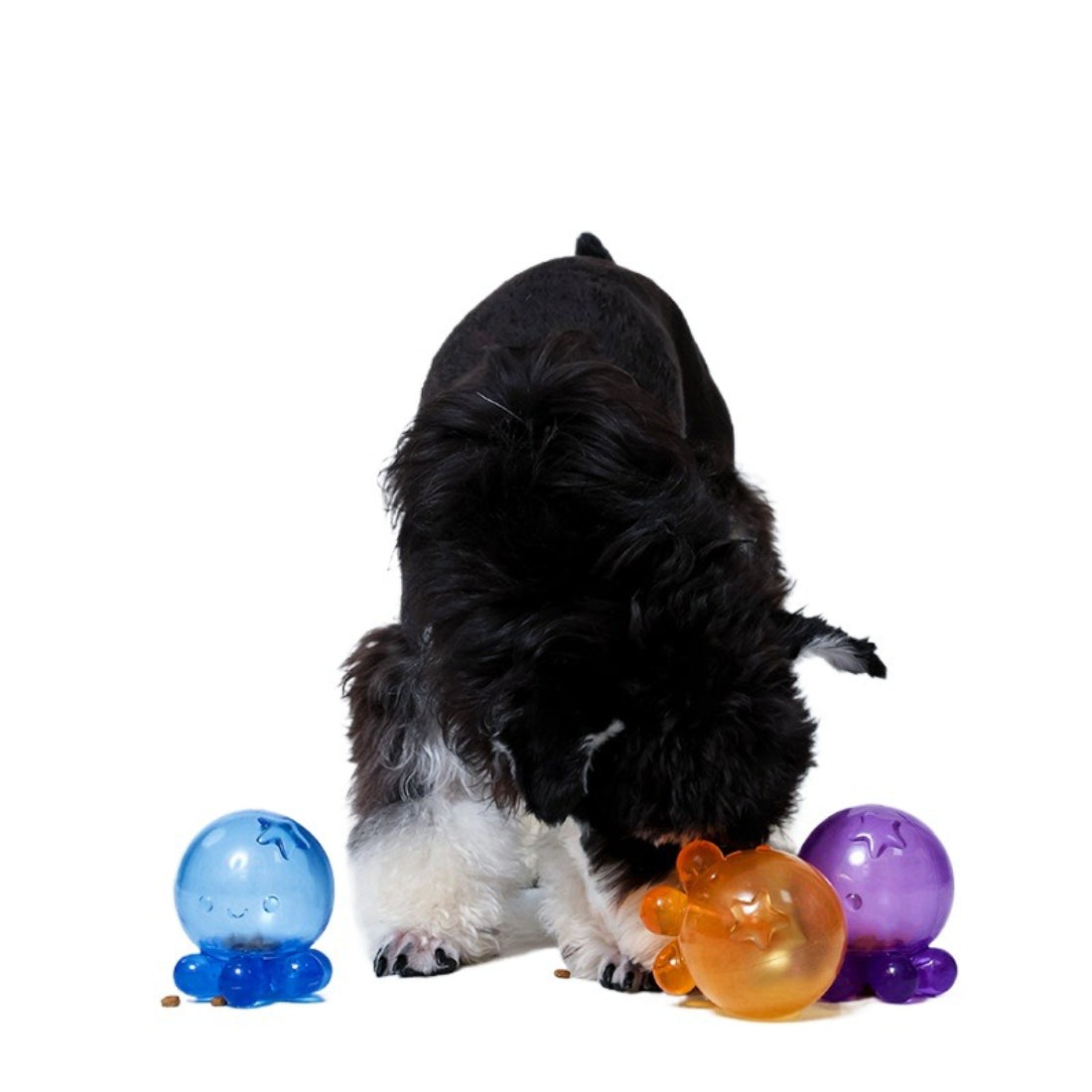 Petkin Interactive Treat Ball dog toy with treat dispensing holes visible