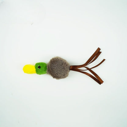Cat playing with Moo fluffy bird toy on stick, engaging with feathers