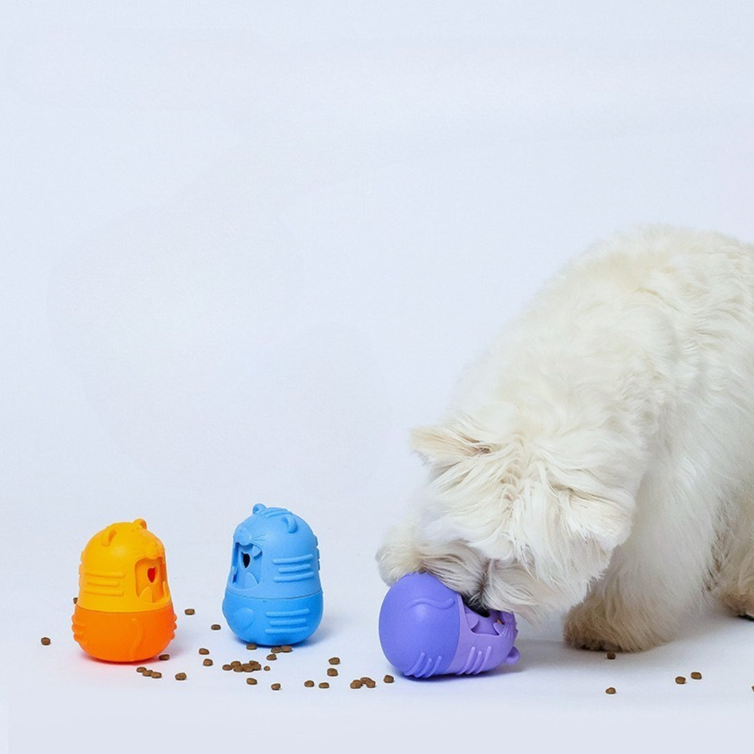 Petkin Monster Treat Dispenser dog toy in blue with monster face and treat opening