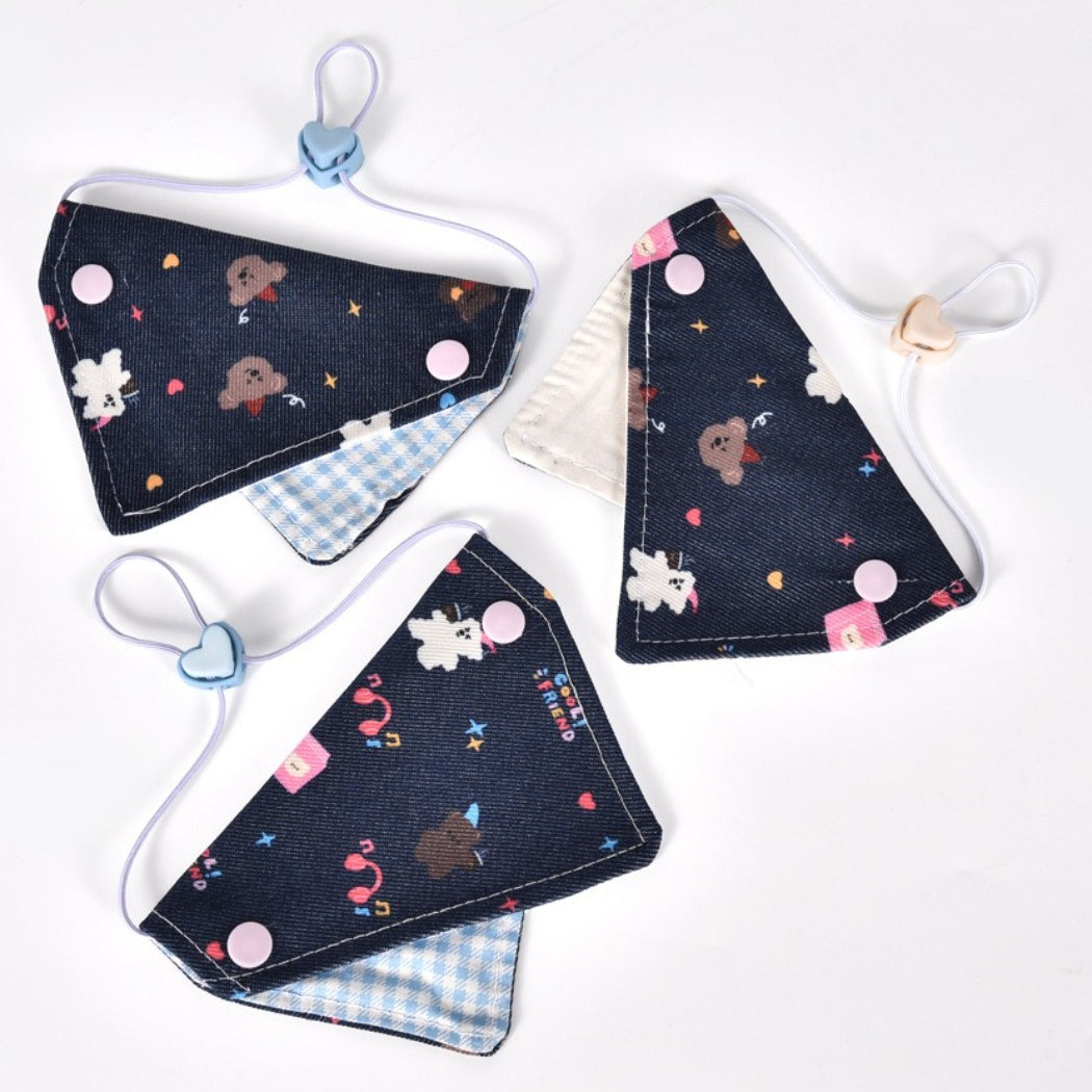 Mokka cartoon print cat bandana collar laid flat showing colorful cat illustrations
