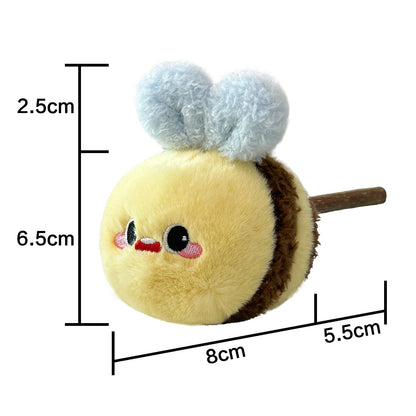 Moo Plush Bee Cat Toy photographed from above highlighting its compact size and design