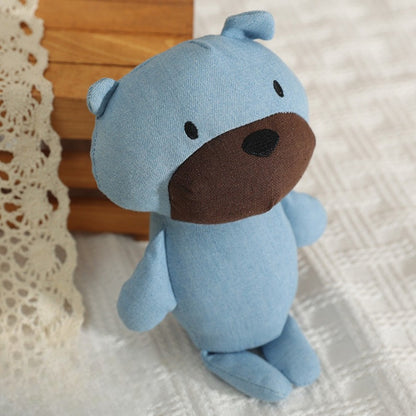 Side view of Petkin bear plush dog toy highlighting textured fabric and shape