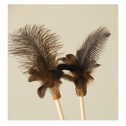 Moo Interactive Feather Wand Cat Toy held in hand showing size and feather details
