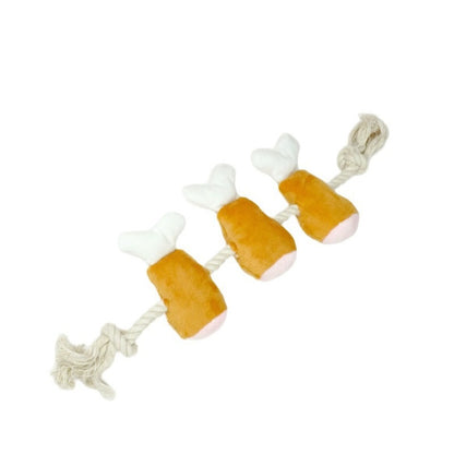 Top view of the red rope dog toy with beige chicken drumstick plush attached