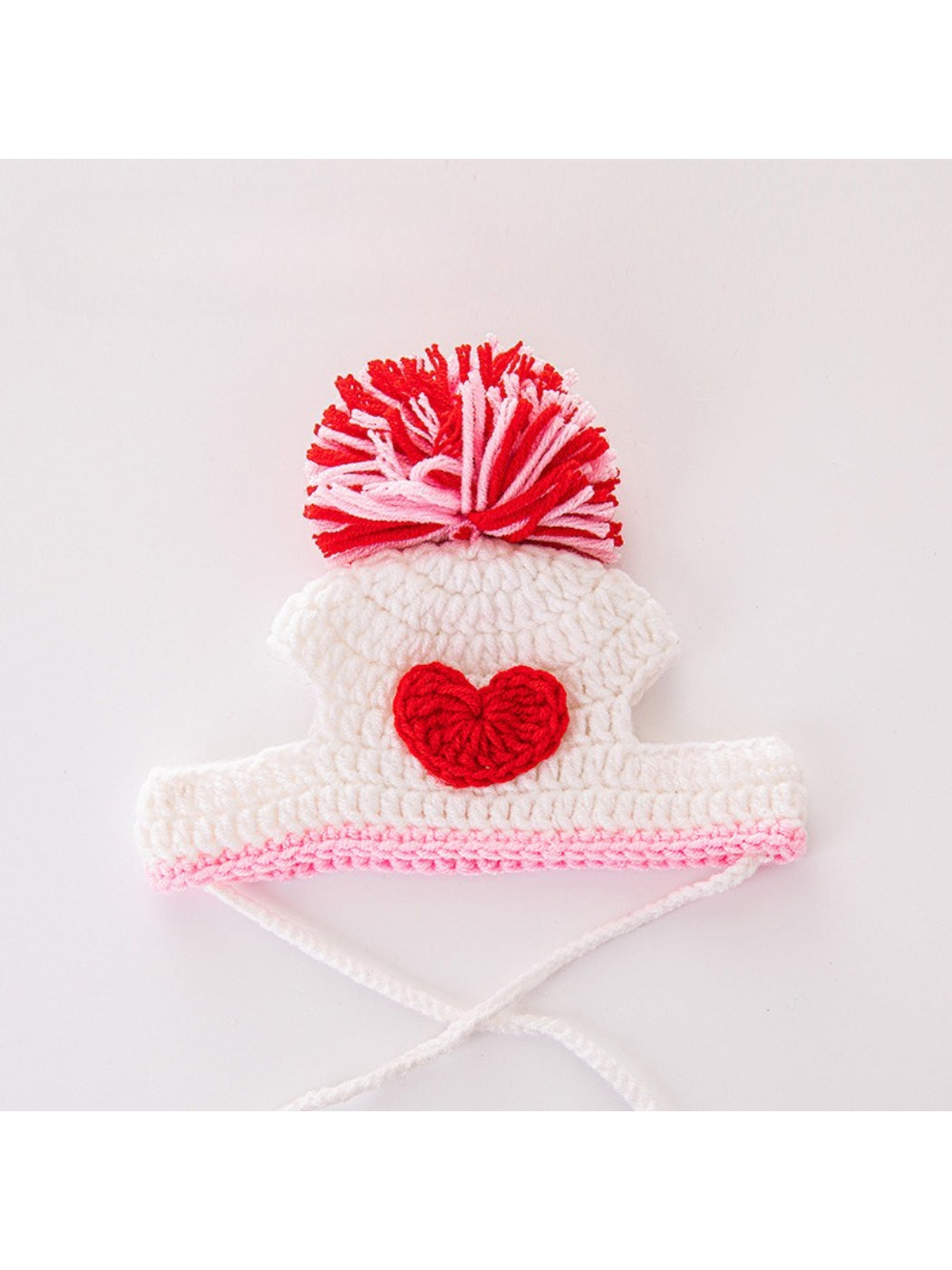 Ozzie Pom Pom Knit Cat Hat with pom pom positioned on top against plain background