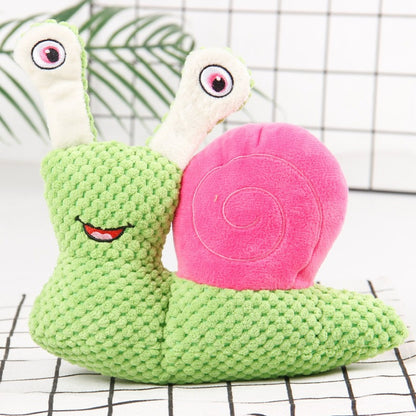 Side view of Petkin Snail Plush Dog Toy highlighting its plush texture
