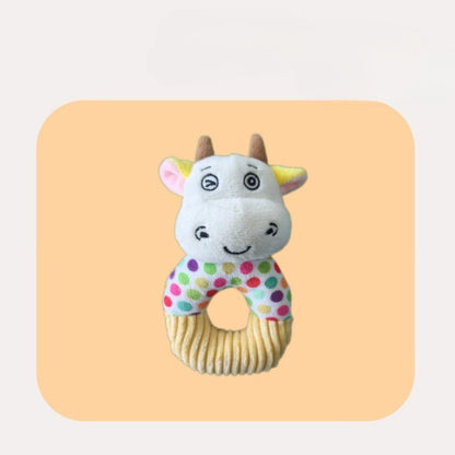 Petkin cow dog plush toy with rope ring positioned upright