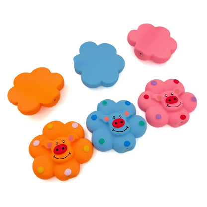 Close-up of Petkin Flower Pig Squeaky Toy highlighting facial features
