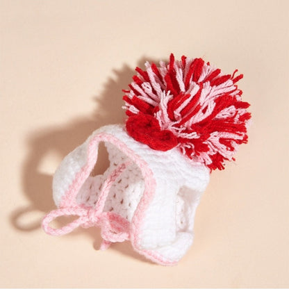 Ozzie Pom Pom Knit Cat Hat laid flat highlighting shape and pom pom