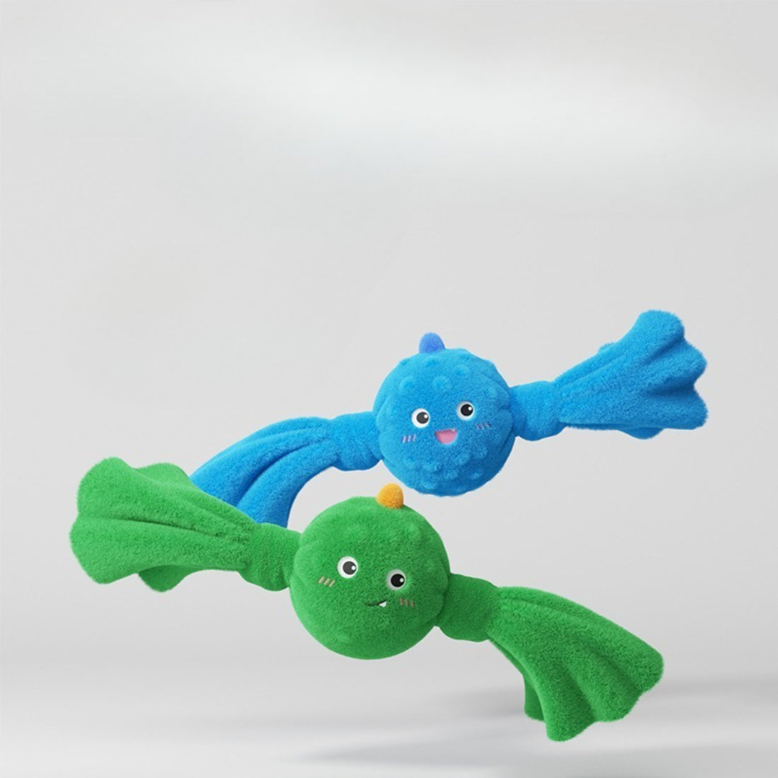 Petkin Monster Plush Ball dog toy in green with monster face design
