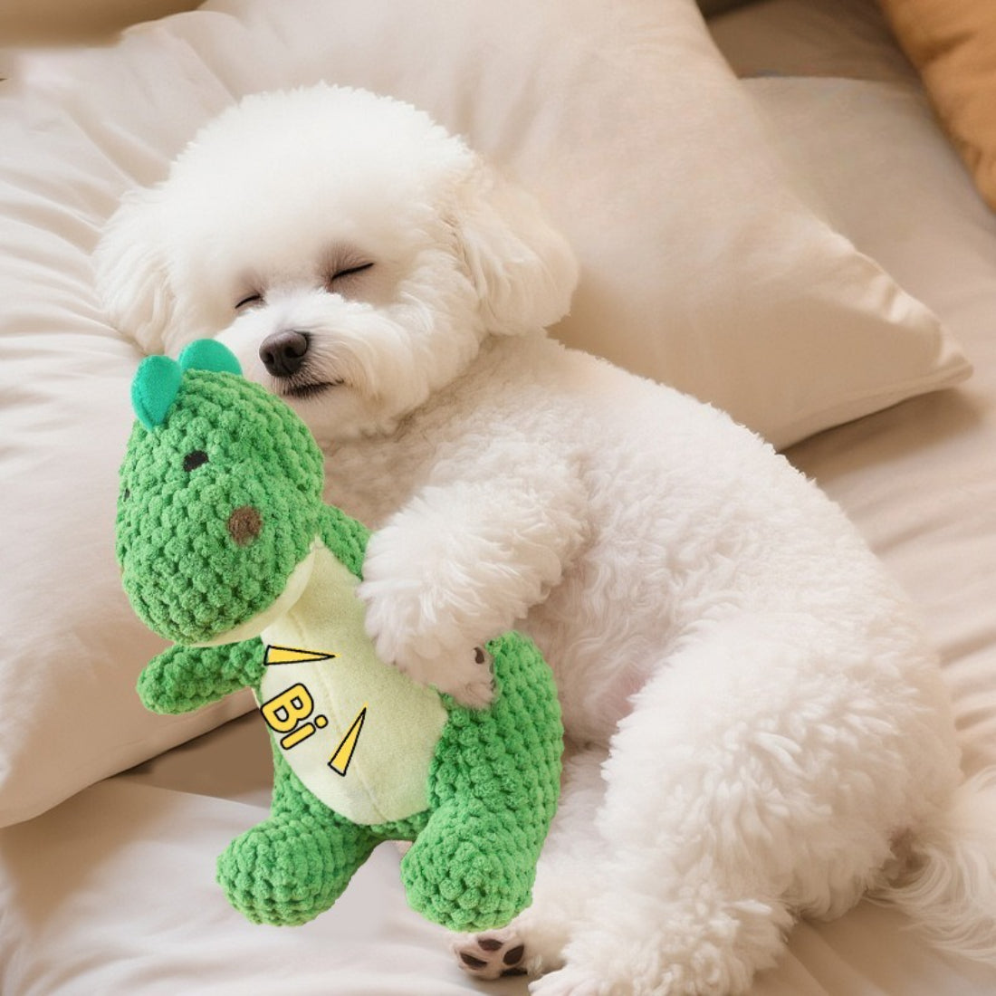 Side view of Petkin Cute Dino Dog Plush Toy showing orange spikes and tail