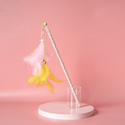 Moo Interactive Feather Wand displayed on white background with colorful feathers