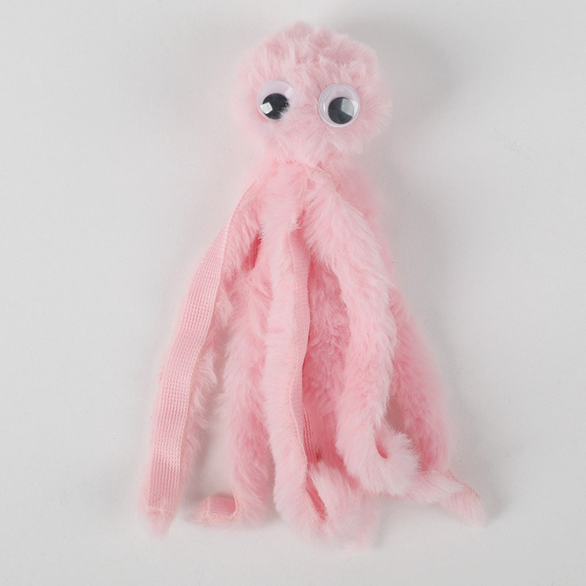 Petkin plush octopus cat toy held in hand to show size and softness